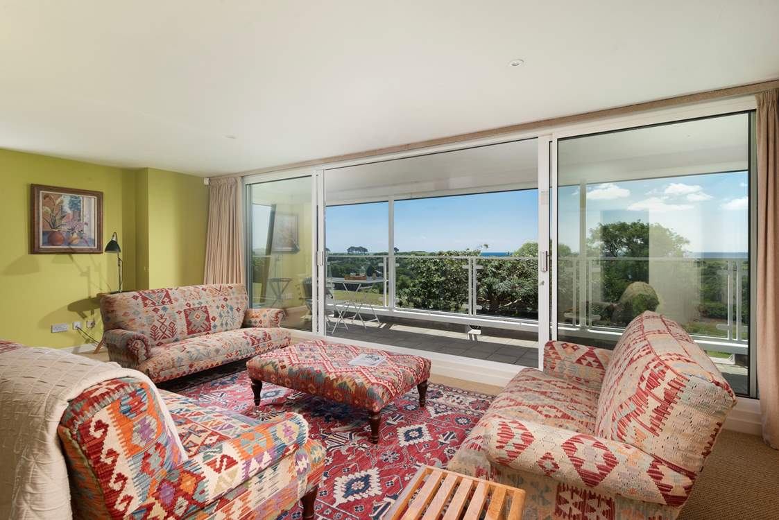The upstairs sitting-room with a fabulous balcony.