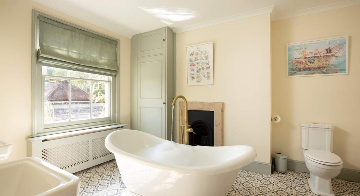 Unwind with an indulgent soak in the roll-top bath.