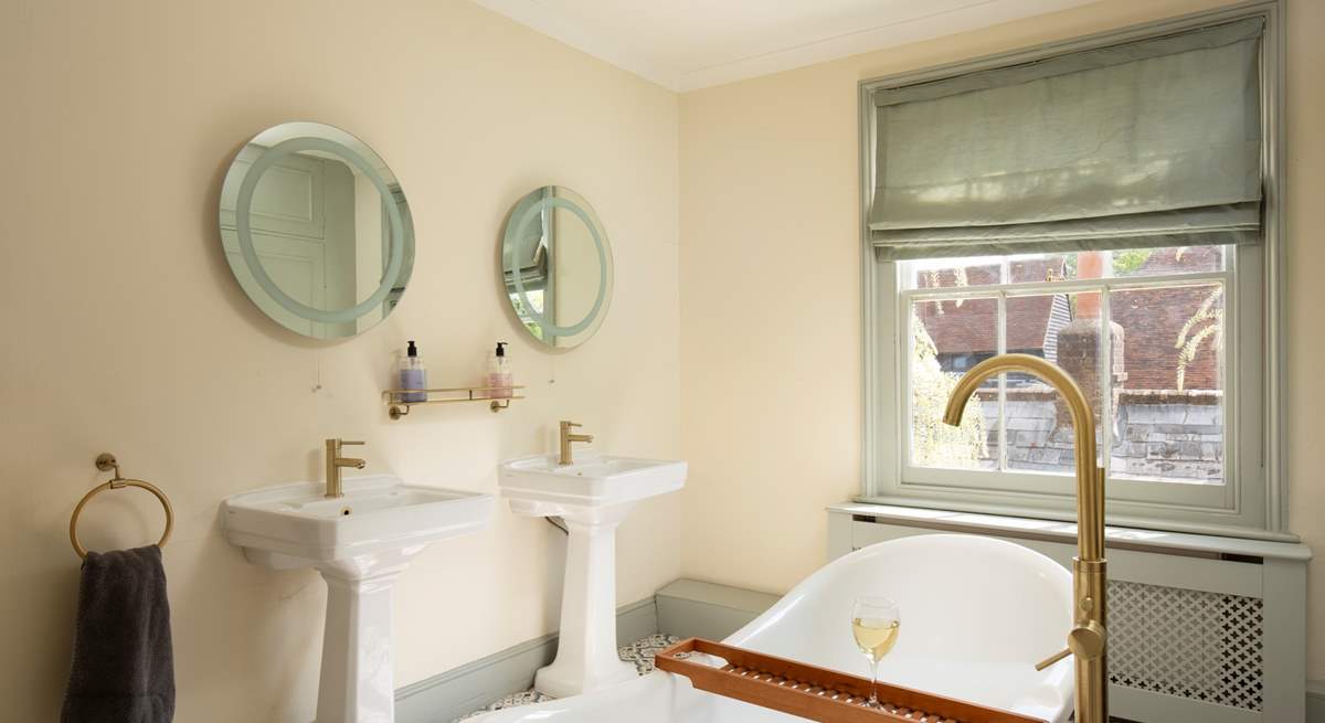 The family bathroom with twin wash-basins.