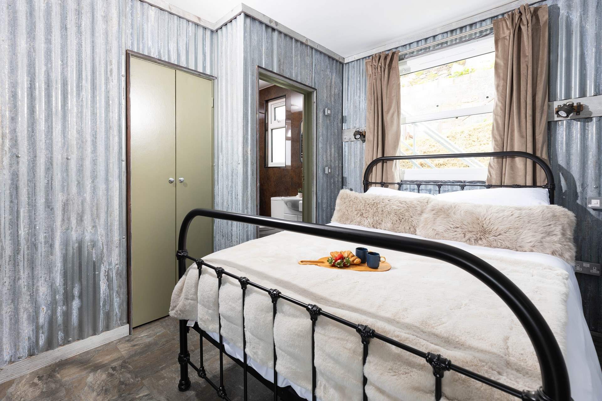 The second bedroom has its own Smart TV.