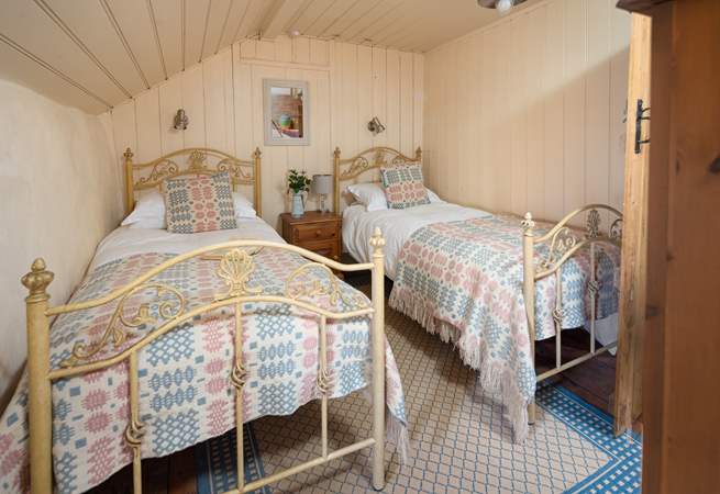 The sweetest twin room with luxurious Welsh wool furnishings. 