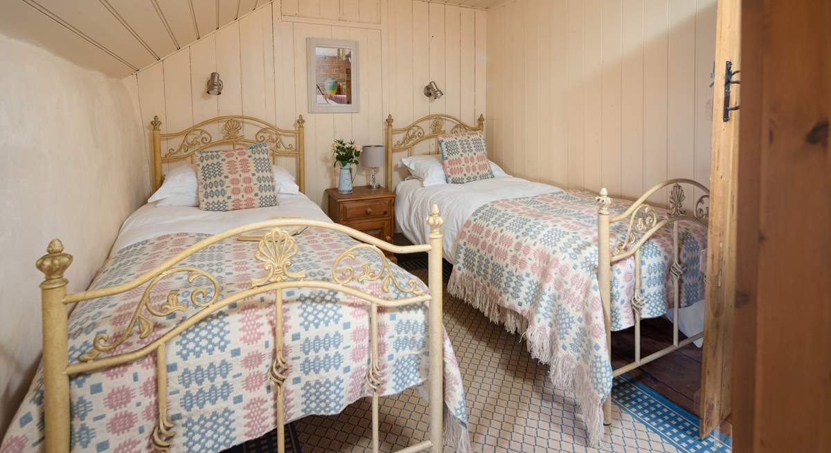 The sweetest twin room with luxurious Welsh wool furnishings. 