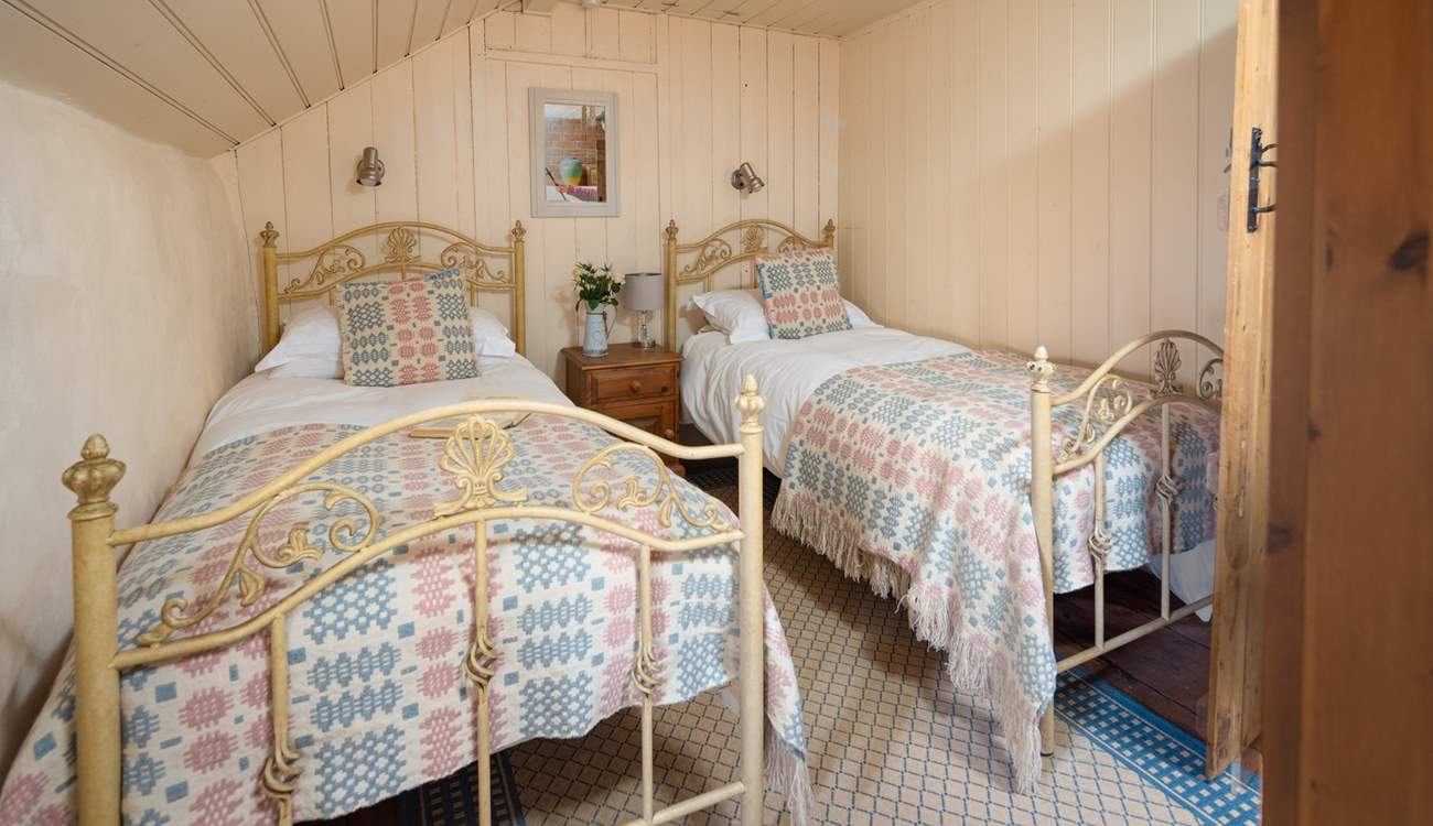 The sweetest twin room with luxurious Welsh wool furnishings. 