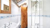 The light and airy bathroom is on the ground floor.