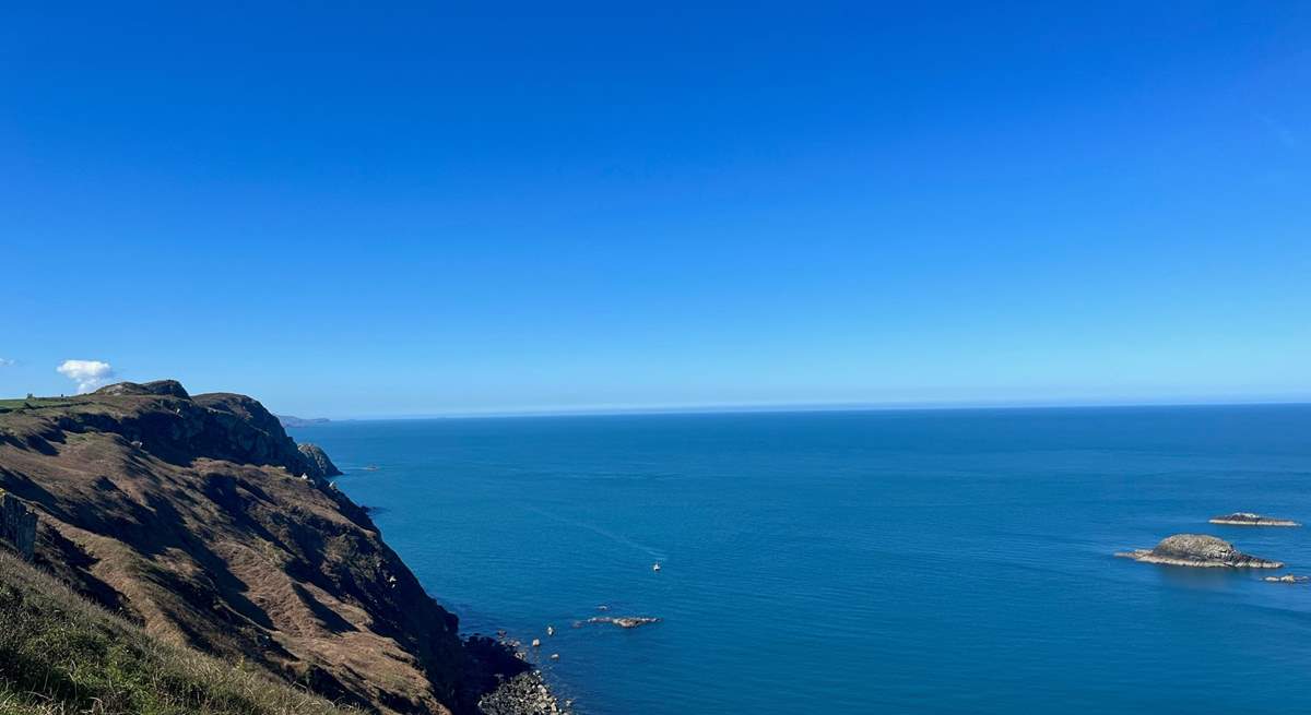 Crystal blue sea and dramatic cliffs of Strumble Head