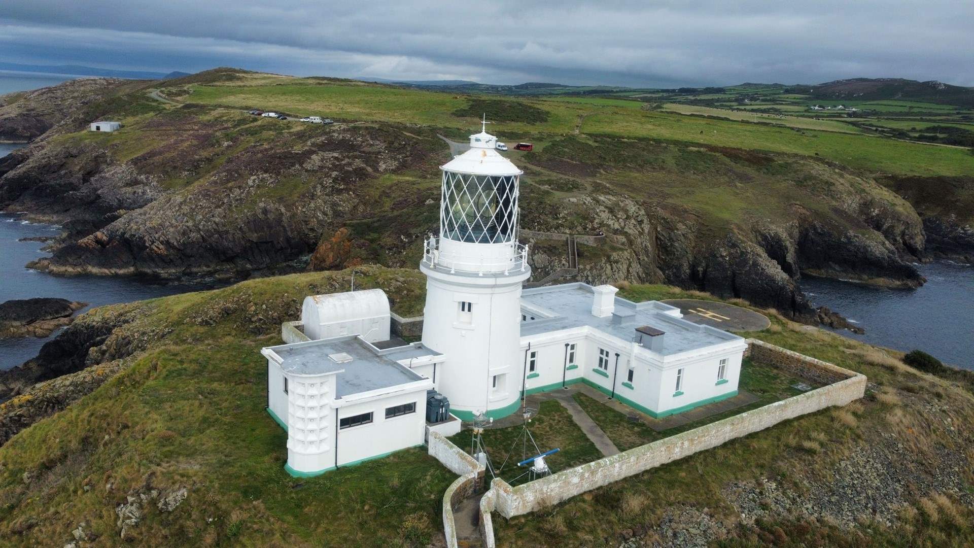 Standing on the cliff top, Stumble Head lighthouse.