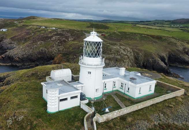 Standing on the cliff top, Stumble Head lighthouse.