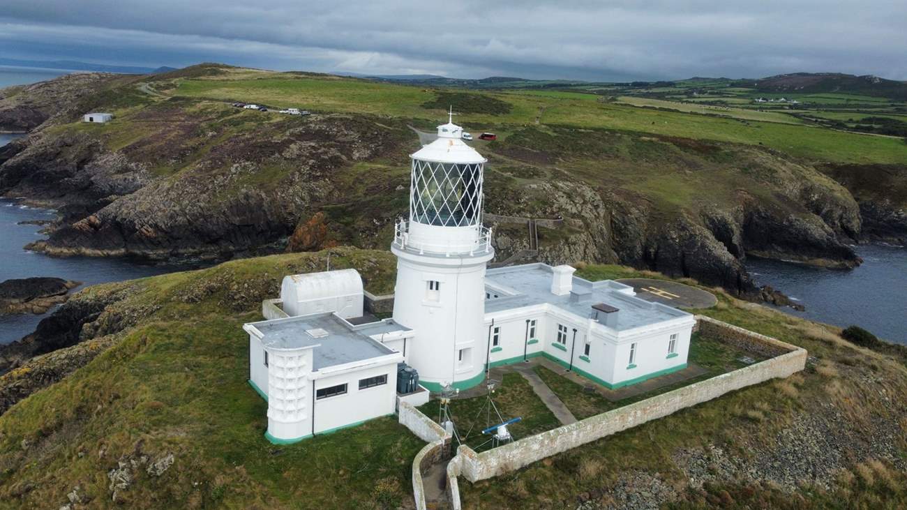 Standing on the cliff top, Stumble Head lighthouse.