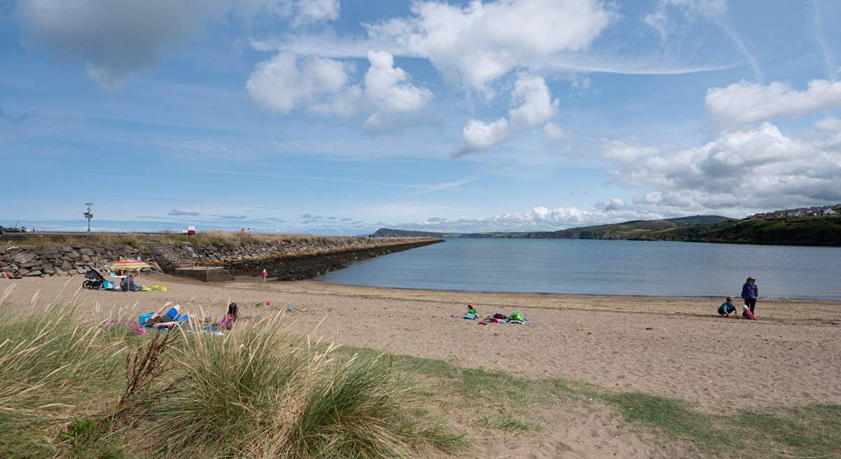 Goodwick Beach. Walk the breakwater. You may spot seals and dolphins swimming in the bay. 