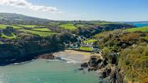 Pack a picnic and spend time in the sheltered cove at Cwm yr Eglwys. 