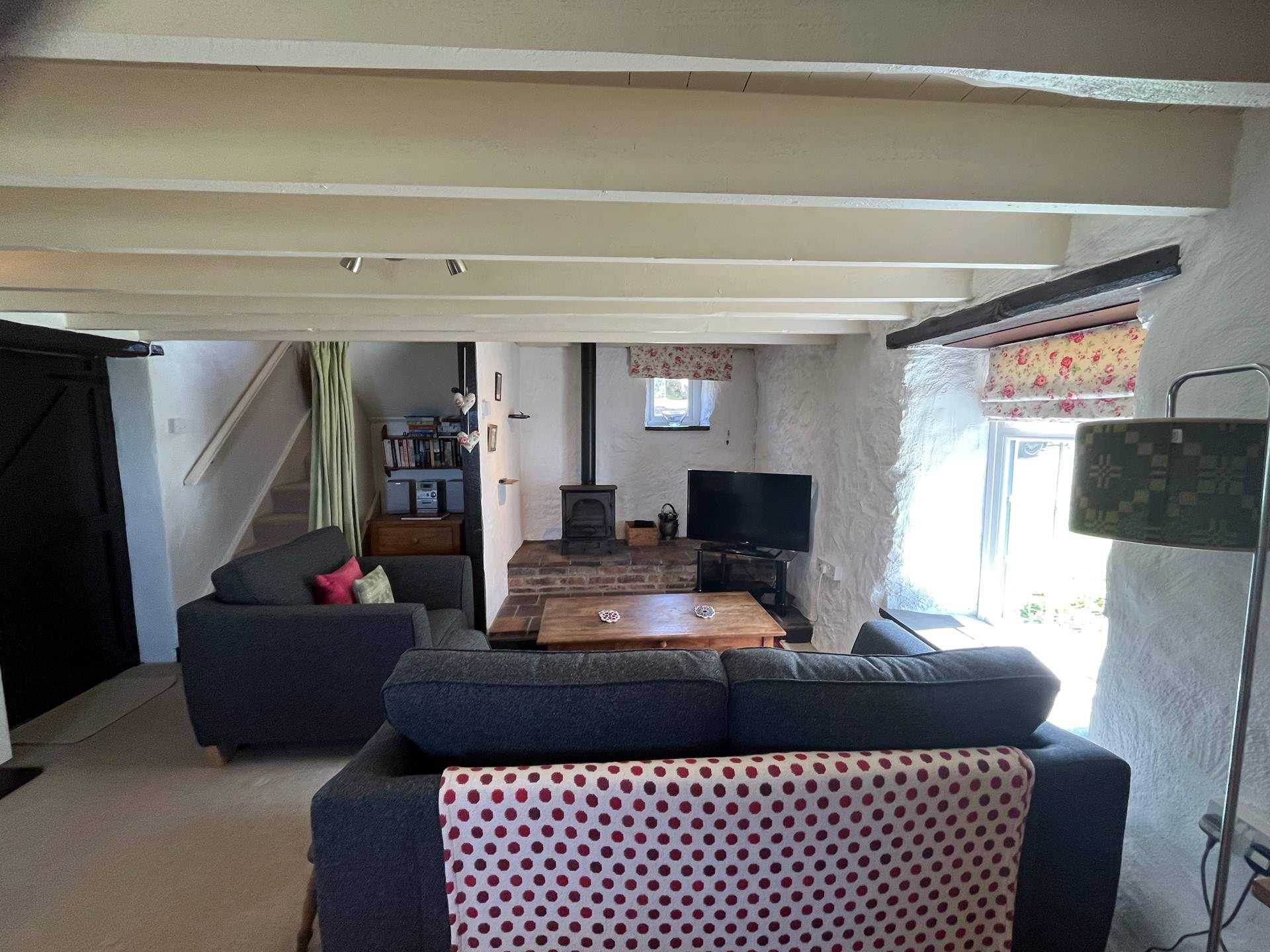 The enchanting sitting/dining-room is where timeless tradition meets contemporary comforts. 