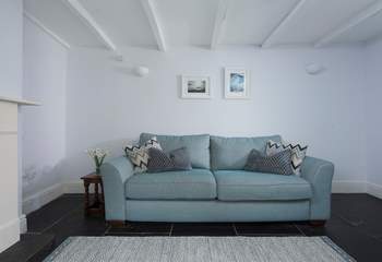 Plenty of room for everyone to relax in the sitting-room. 