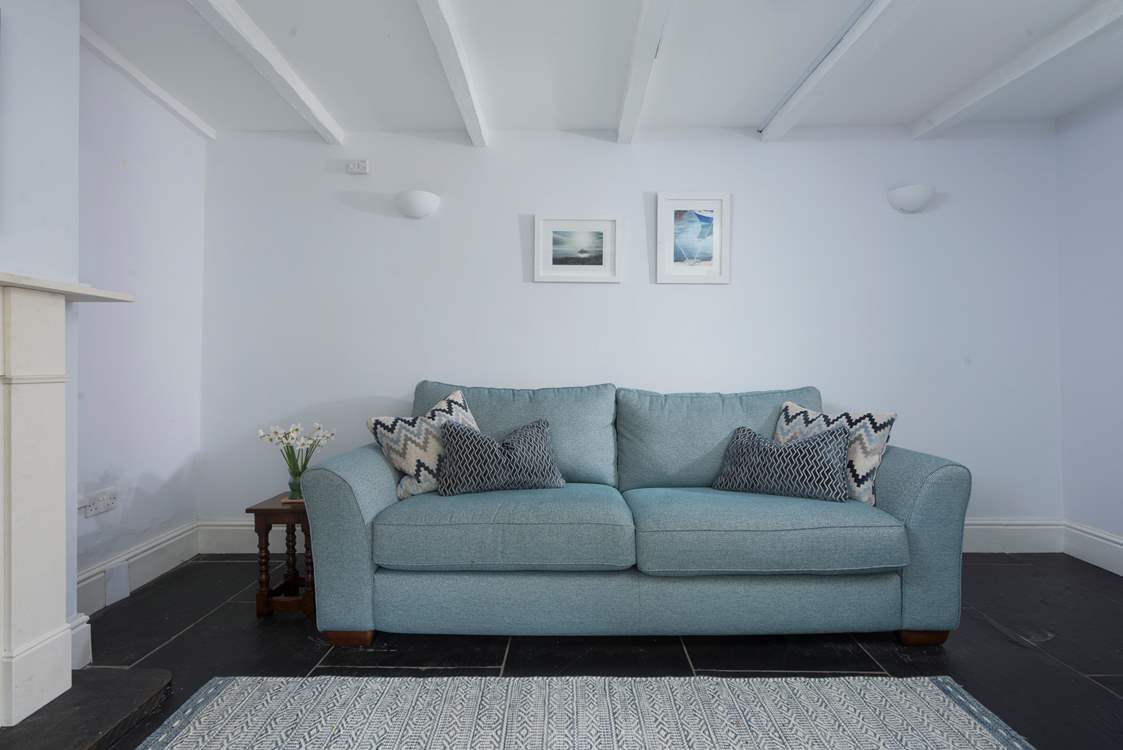 Plenty of room for everyone to relax in the sitting-room.