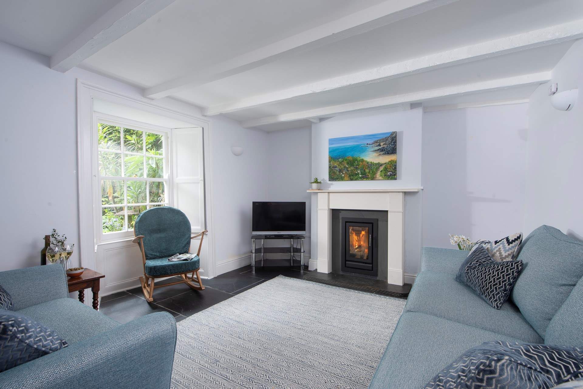 The wood-burner makes this a lovely cosy room, enjoy long evenings in front of the fire. 