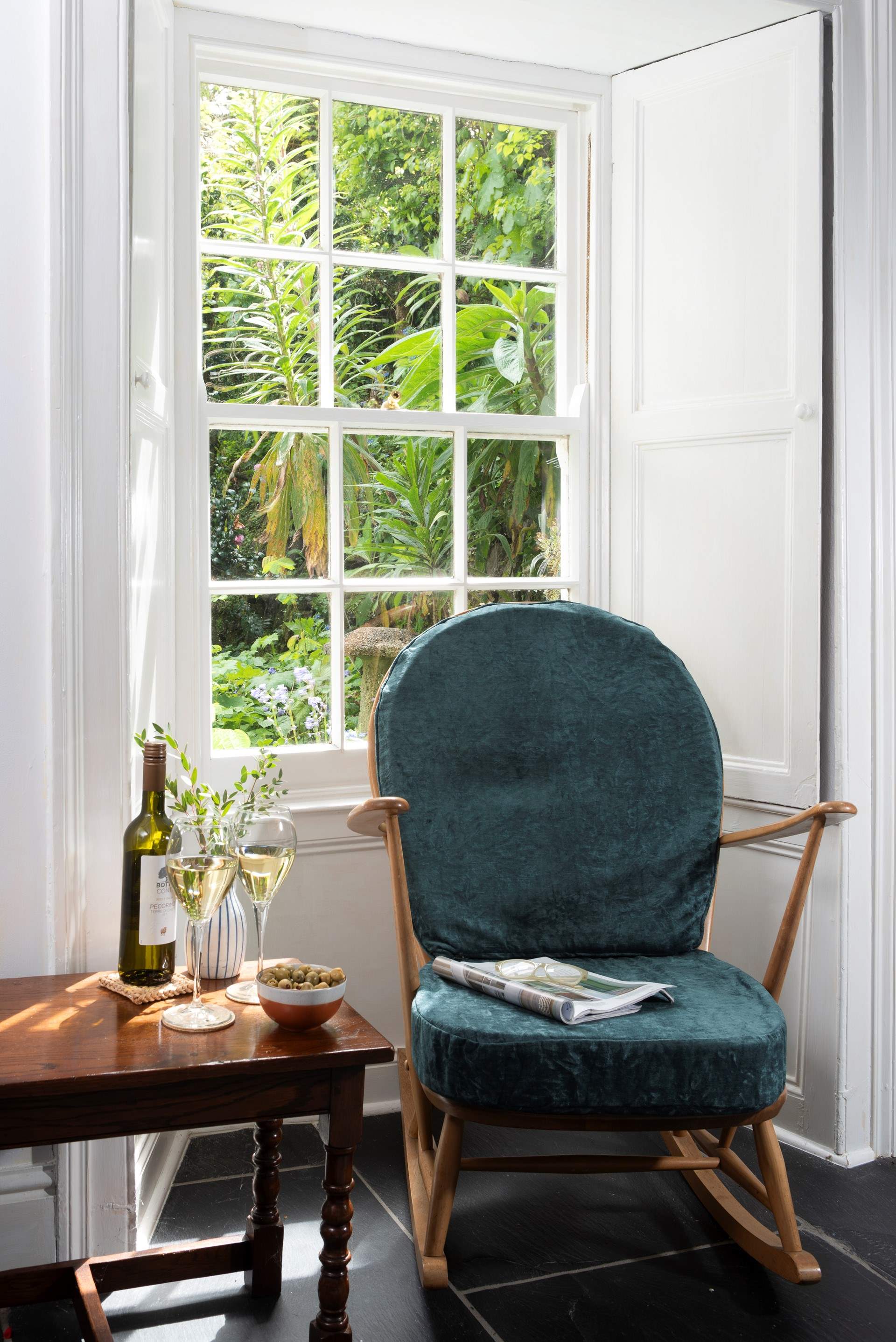 Take a perch in the window and look out over the pretty front garden. 