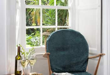 Take a perch in the window and look out over the pretty front garden. 