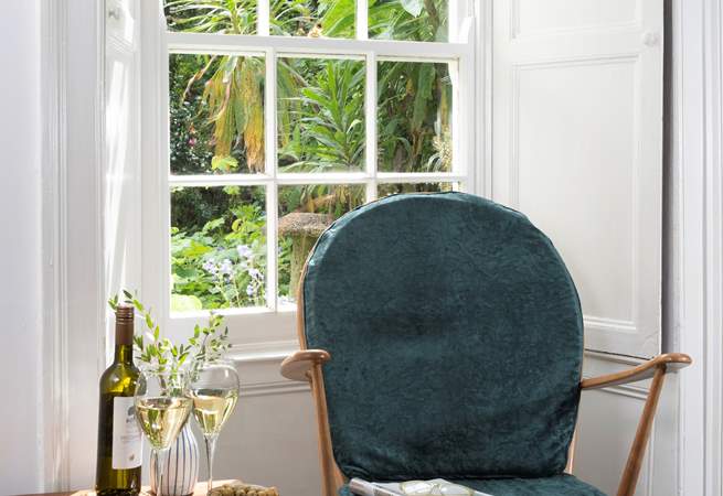 Take a perch in the window and look out over the pretty front garden. 