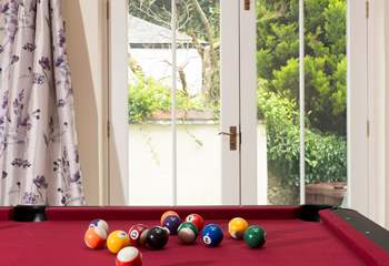 Double doors open to the sunny patio. 