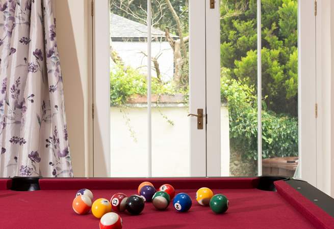 Double doors open to the sunny patio. 