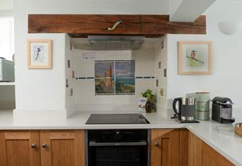 The family have hand-painted beautiful tiles throughout the cottage. 