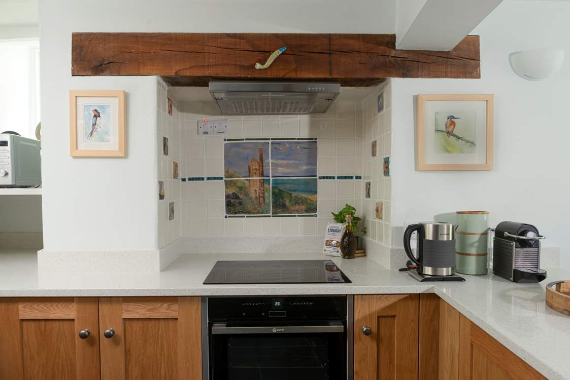 The family have hand-painted beautiful tiles throughout the cottage.