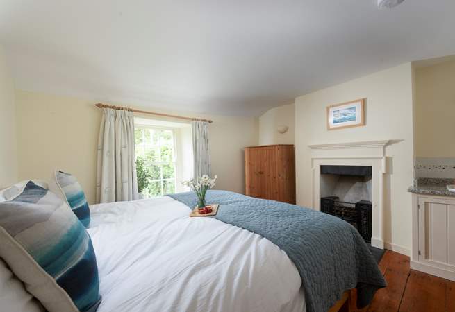 This bedroom has a huge super-king bed which can also be turned into twins, and a handy sink too.