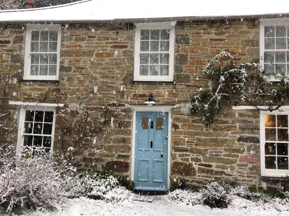 Grove Cottage is as pretty as a picture in the snow.