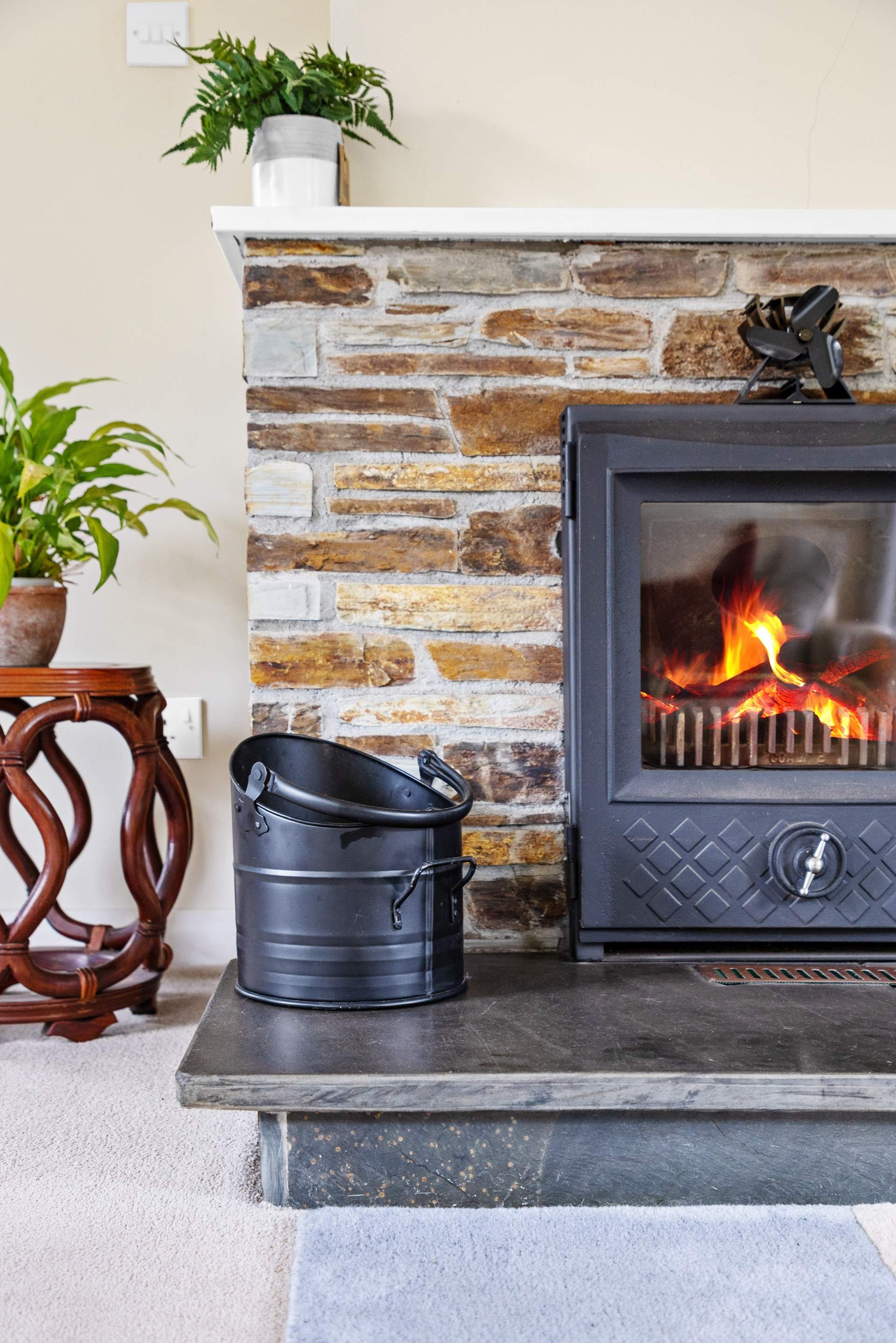 The warming wood-burning stove makes this the perfect year-round retreat.