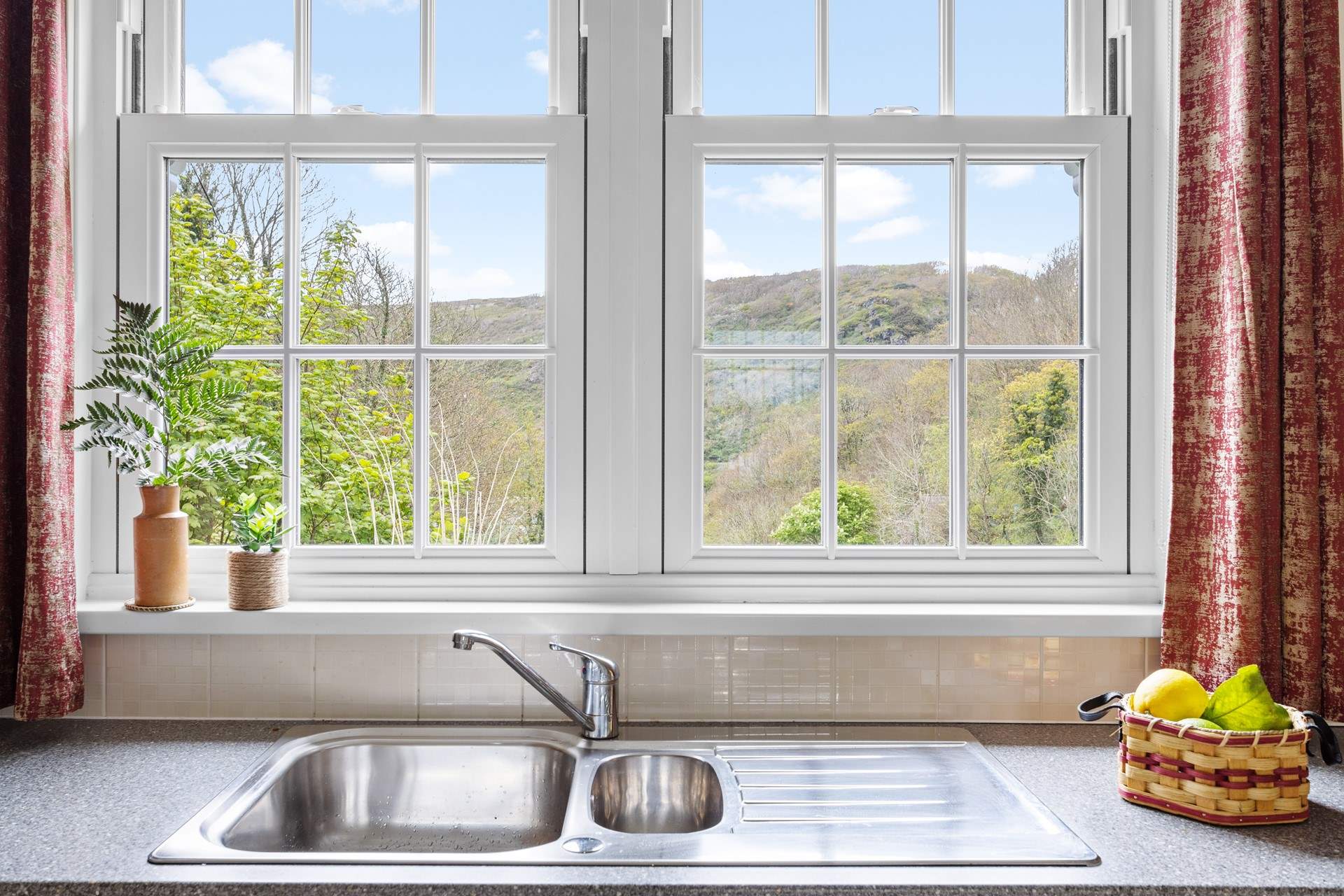 There is a wonderful view from the kitchen window over the valley beyond.