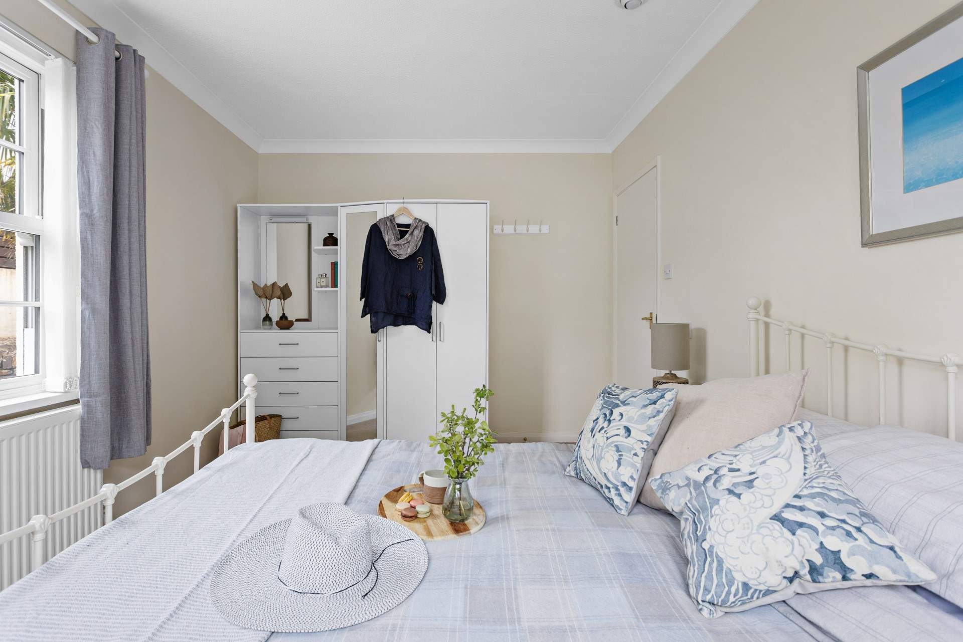 The restful hues perfectly complement the coastal setting.