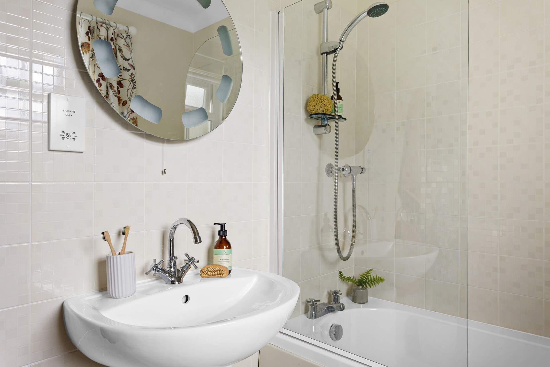 The family bathroom offers a bath for a lovely leisurely soak and a shower for a morning freshen-up.