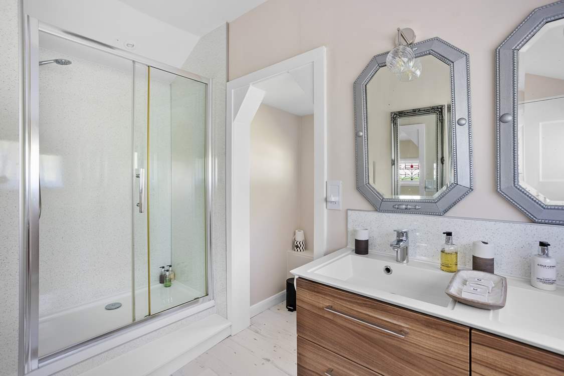 The sparkling shower-room with WC sits next to the kitchen and by the main front entrance door.