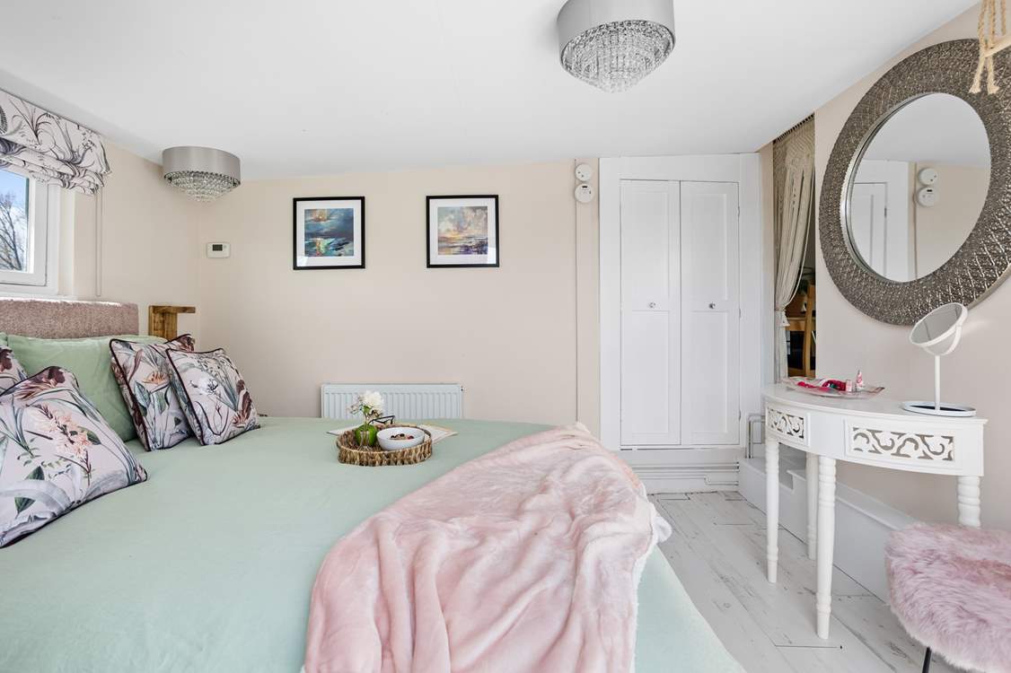 The perfect spot to get ready each morning with the patio doors open and the sun shining in!