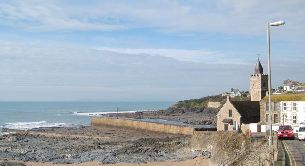 The harbour wall at Porthleven on a calm day.