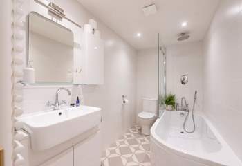 One step up leads you into the modern bathroom. 