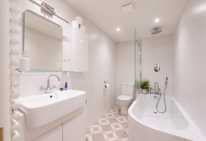 One step up leads you into the modern bathroom. 