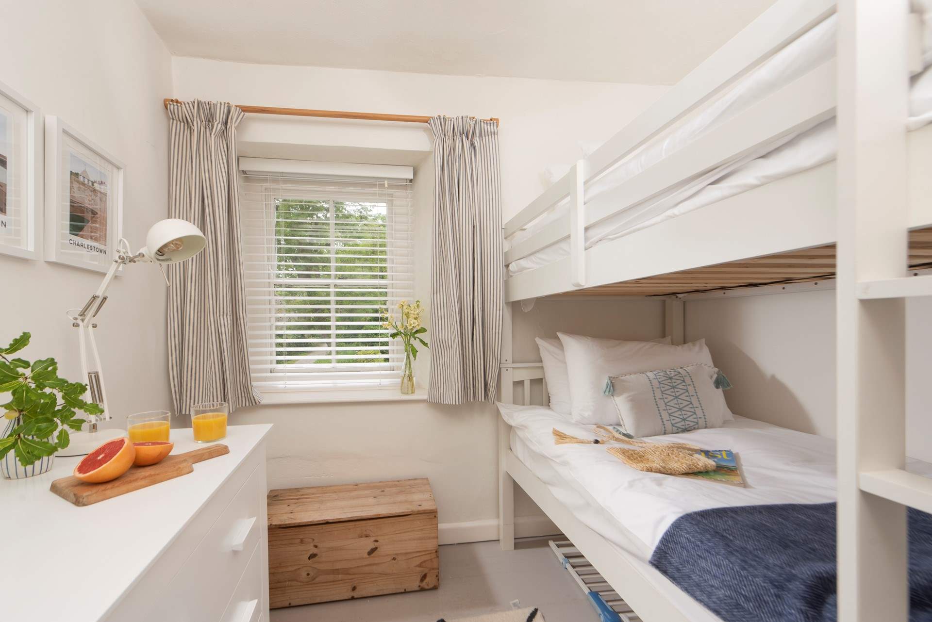 Bedroom 3 is light and bright with bunk-beds (3'). 