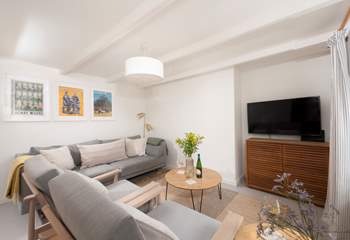 The lovely furnishings make the sitting-room the ideal space to relax after a day out exploring. 