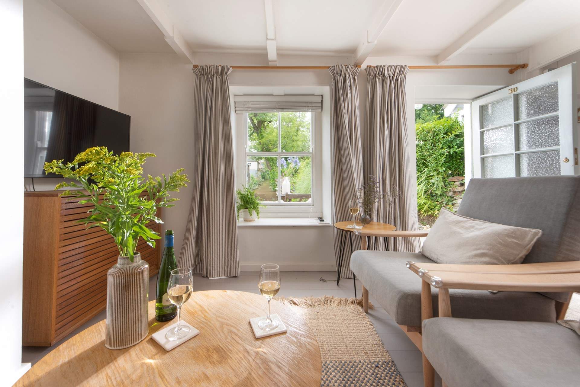 Make yourself at home in the stylish sitting-room. 