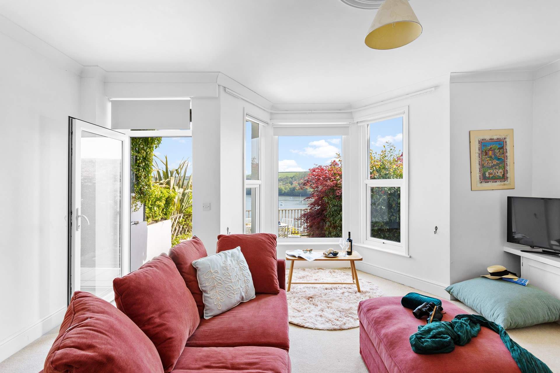 Step out from the sitting-room to the terraced garden at the front.
