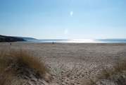 This stretch of coastline offers gentle waters and soft sandy beaches.