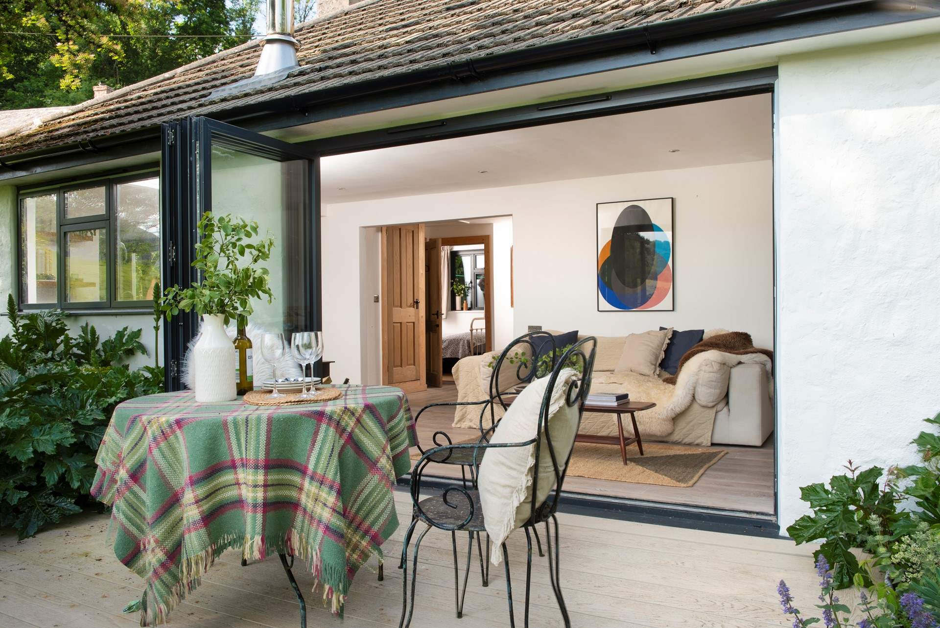 Open up the bi-fold doors to extend your living space into the great outdoors.