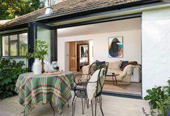 Open up the bi-fold doors to extend your living space into the great outdoors.
