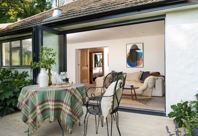 Open up the bi-fold doors to extend your living space into the great outdoors.