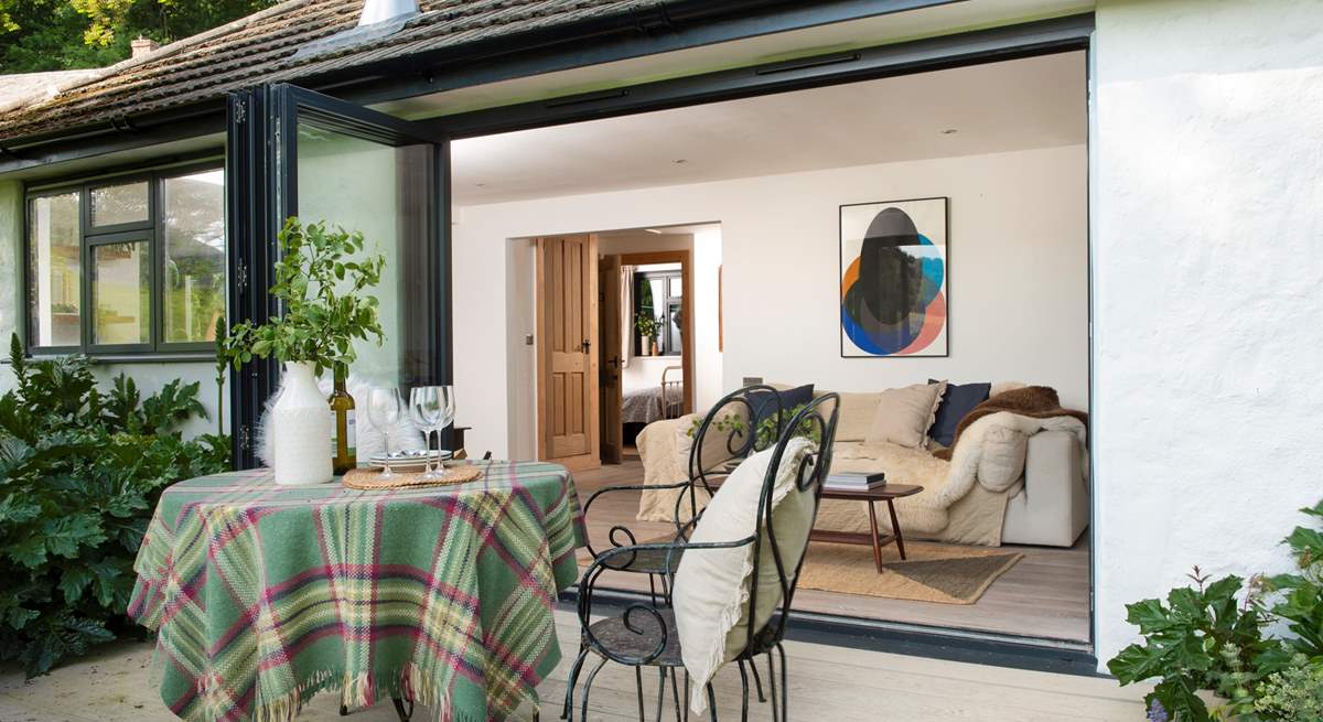 Open up the bi-fold doors to extend your living space into the great outdoors.