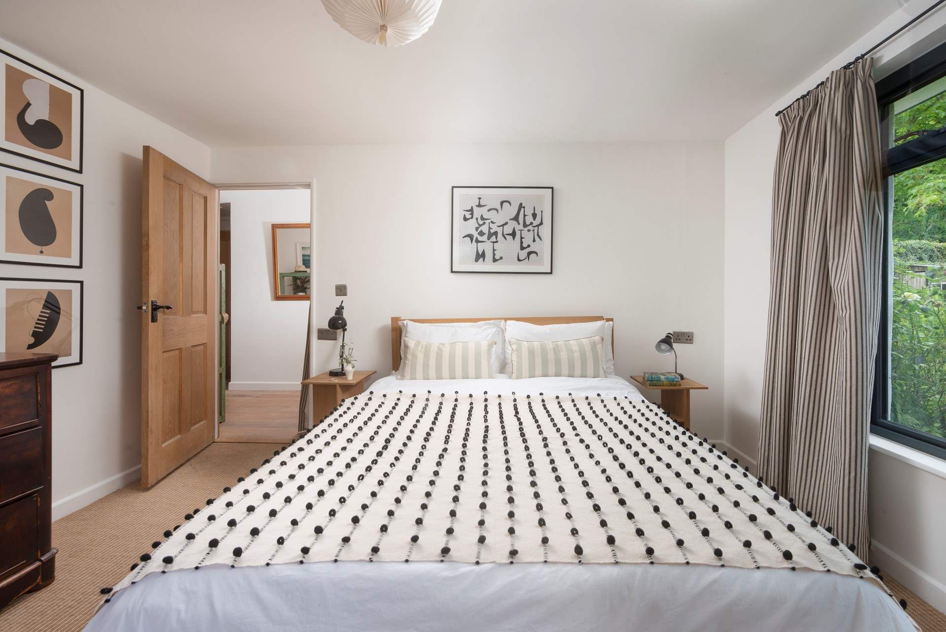 Snuggle up under the covers of the king-size bed in bedroom 1.