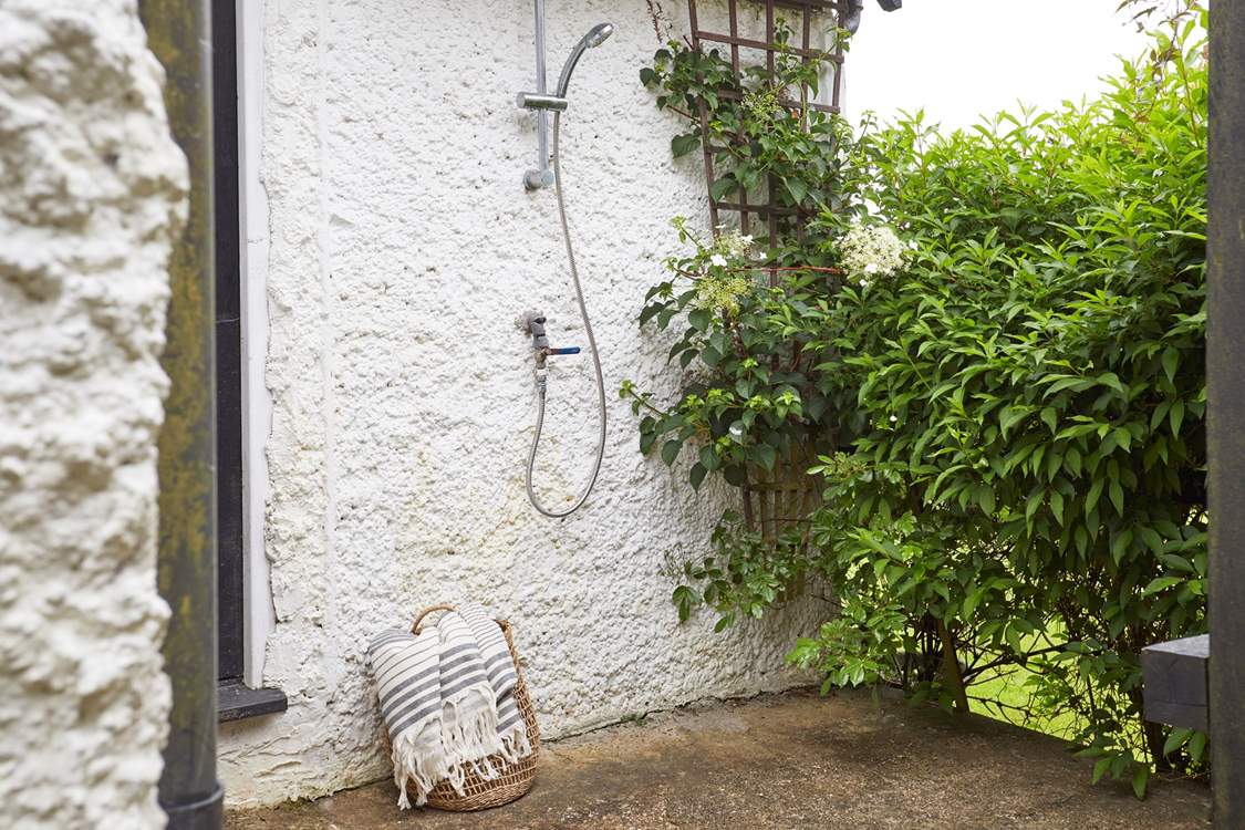 The outside shower is perfect for washing off those sandy toes!