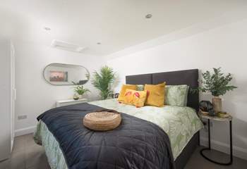 The lovely principal bedroom has oodles of character. 