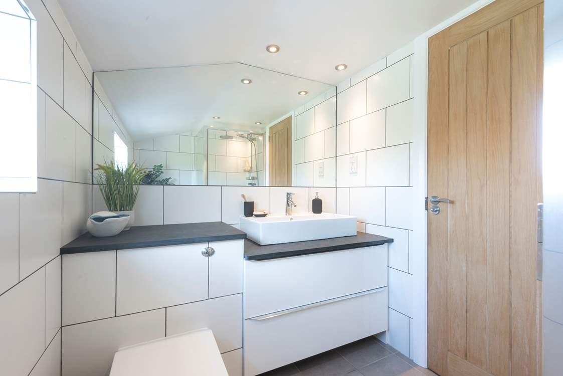The family shower-room is modern and stylish.