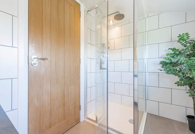 It has a lovely shower cubicle. 